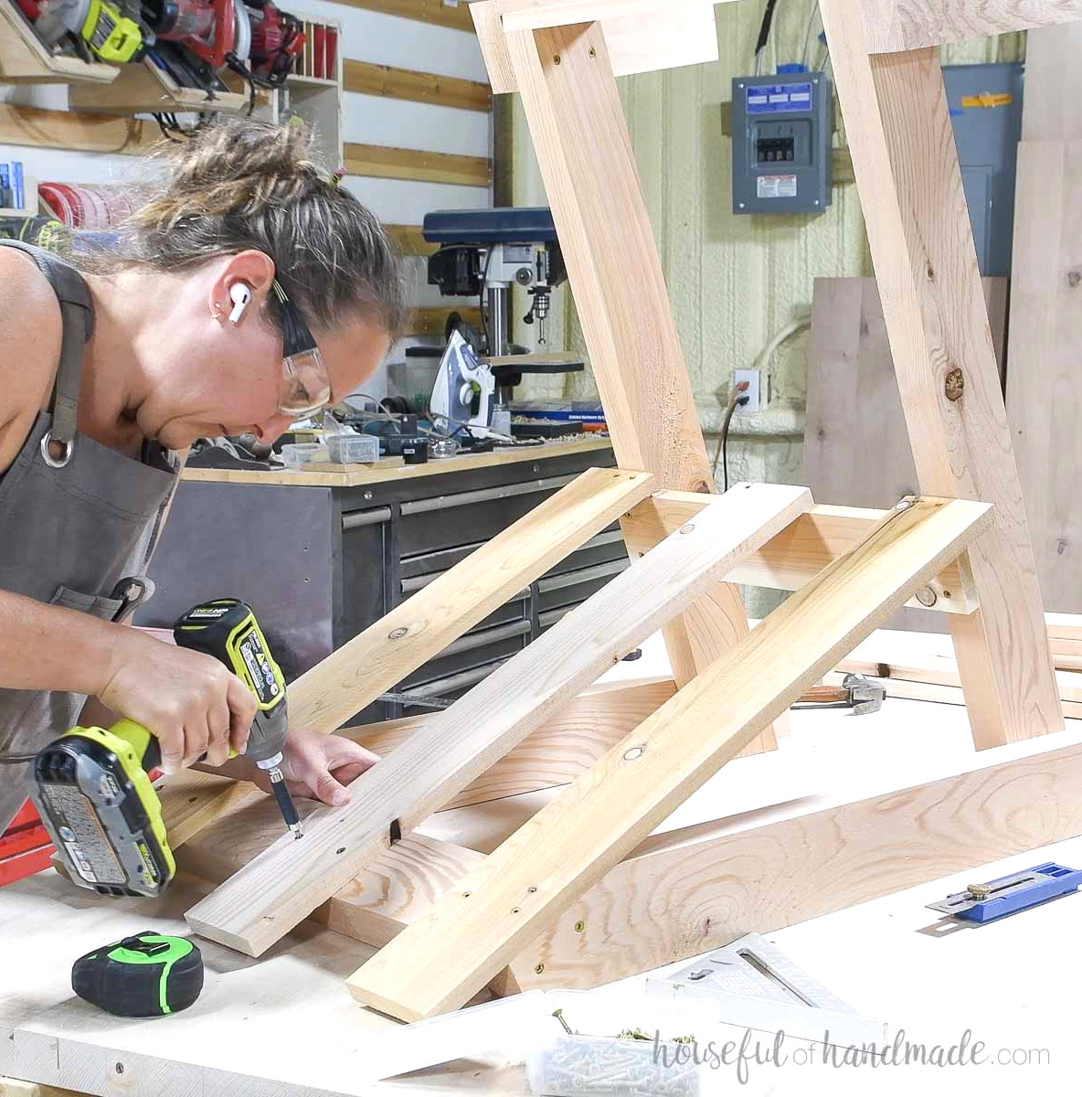 Fastening the chair’s back slats with screws.