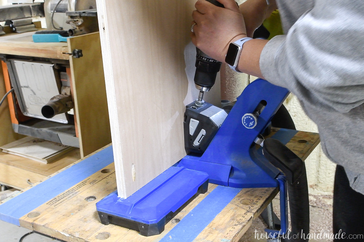 Drilling pocket holes in the display cabinet pieces with a Kreg 720 pro.