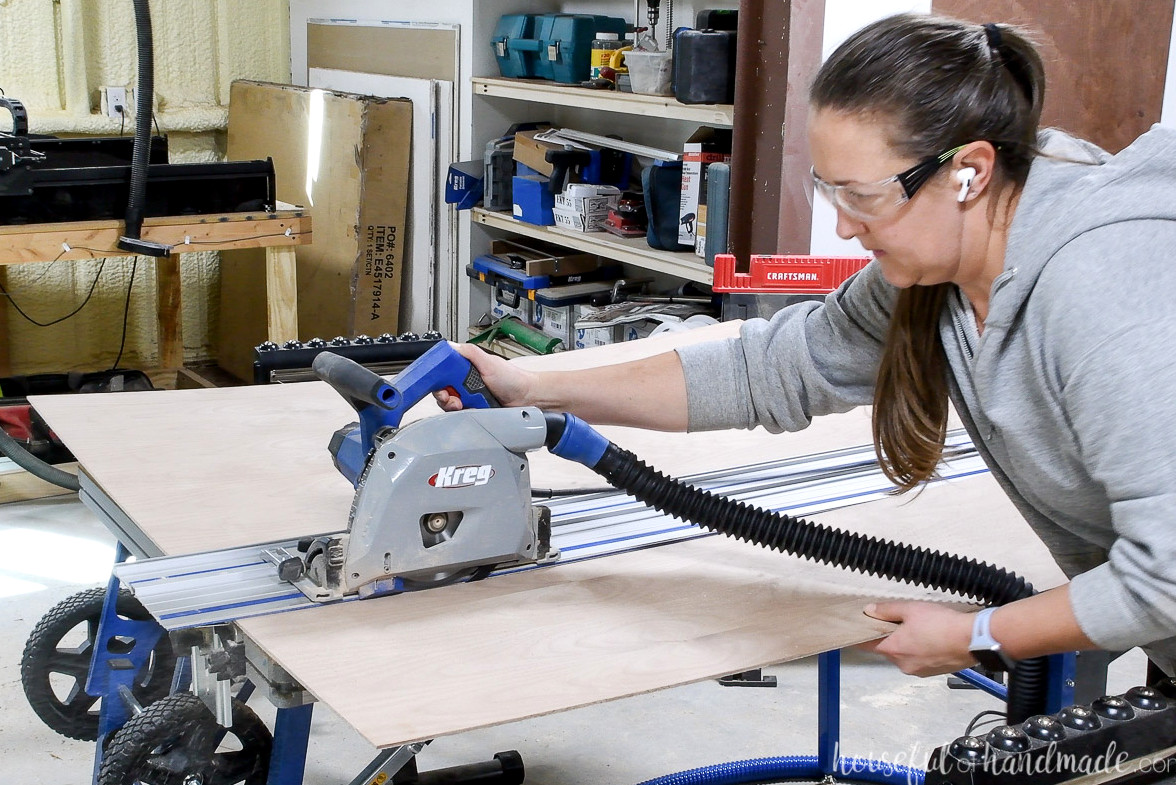 Cutting the thin plywood for the back of the cabinet on the Kreg ACS.