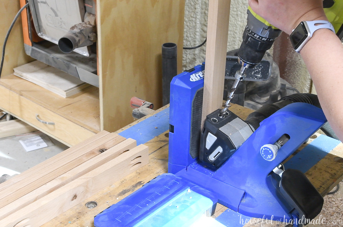 Drilling pocket holes with the Kreg jig.
