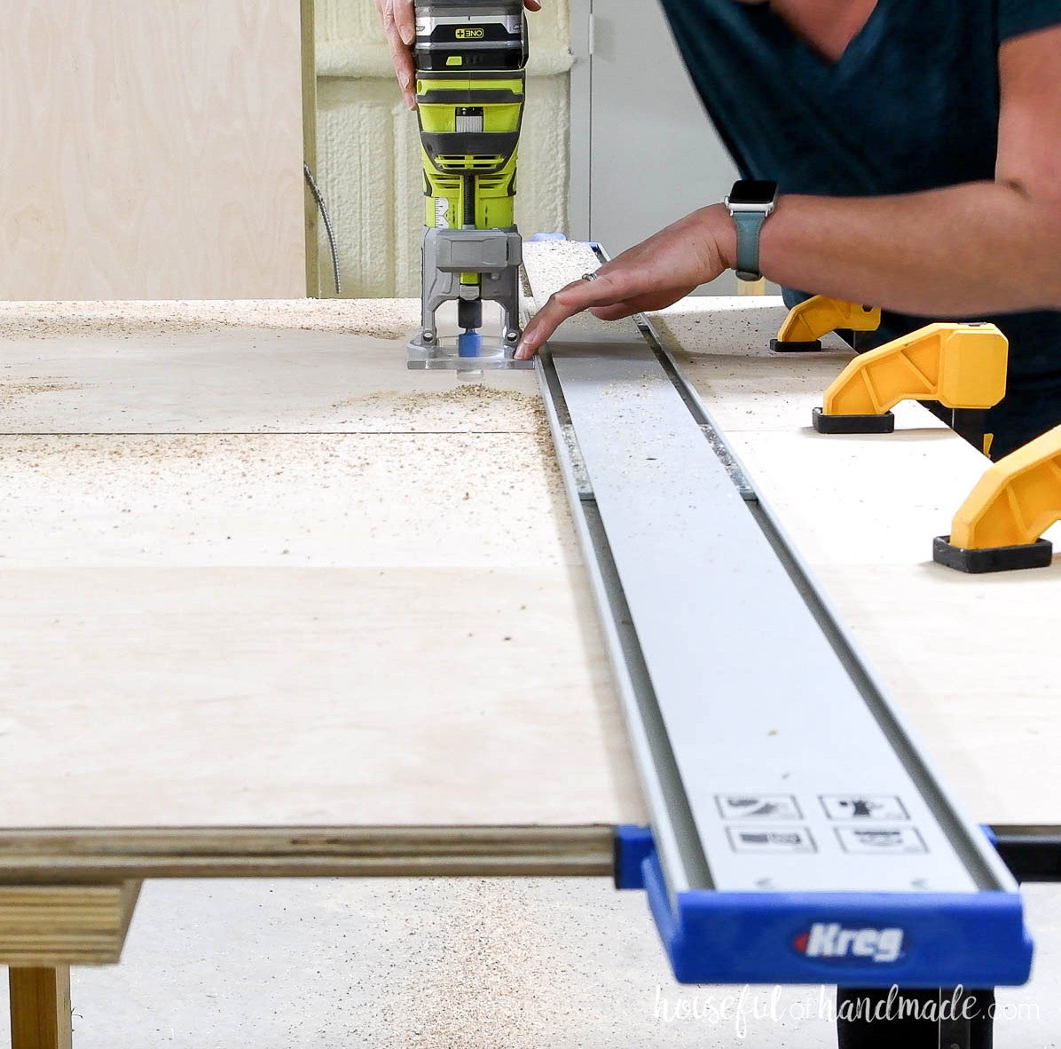 Routering a 1/4" deep dado in the strips of plywood.