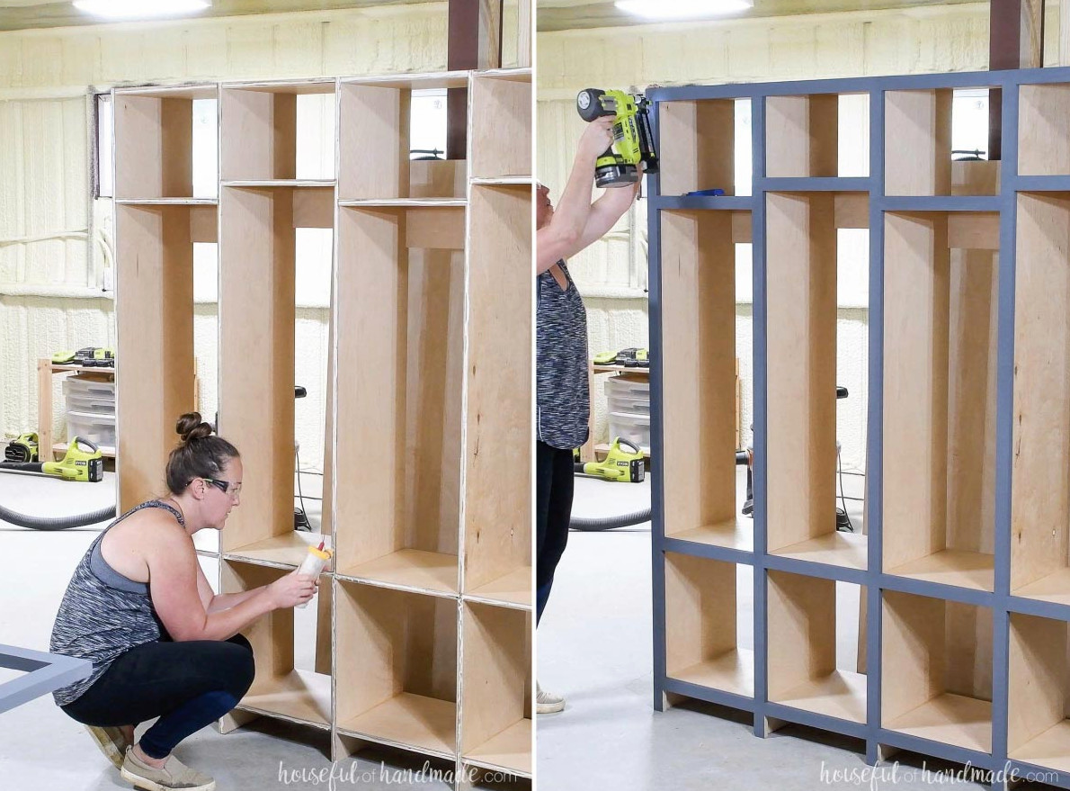Securing the face frame to the cabinet front with brad nails.
