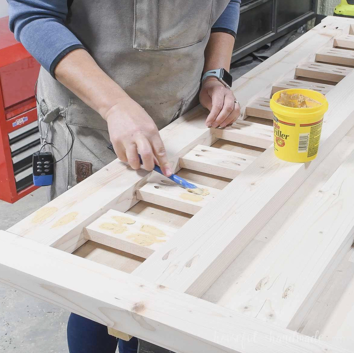 Filling pocket holes with wood filler.