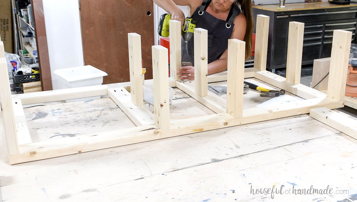 Attaching the center uprights for the frame.