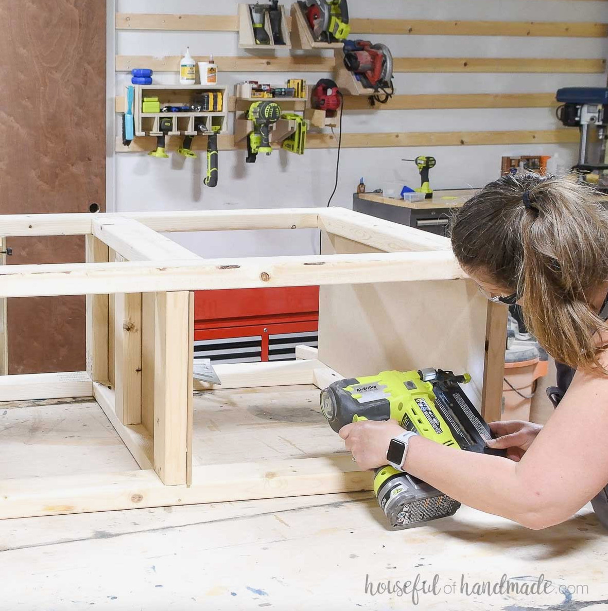 Attaching 1/4" MDF to cover the inside of the 2x4 base. 
