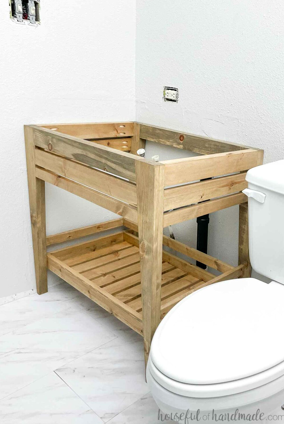 Bathroom vanity constructed from plans created for an affordable bathroom renovation. 