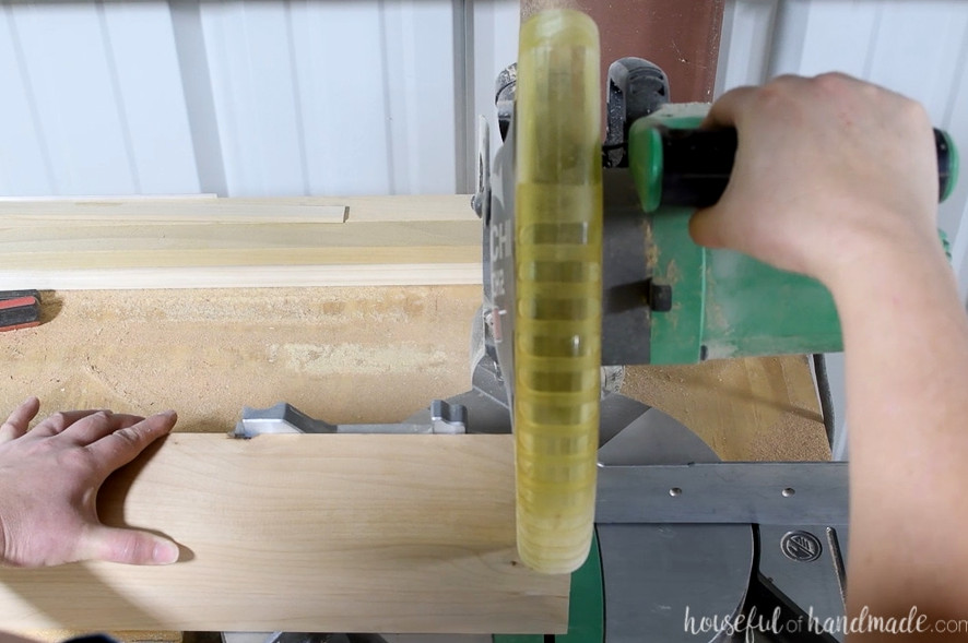 Cutting a 4x4 board on the miter saw.