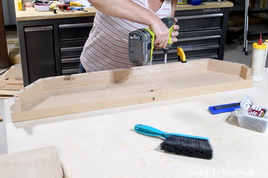 Fastening the skirt end to the breadboard end. 