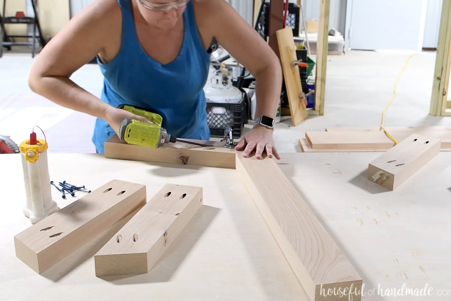 Attaching the base sides to the base center. 