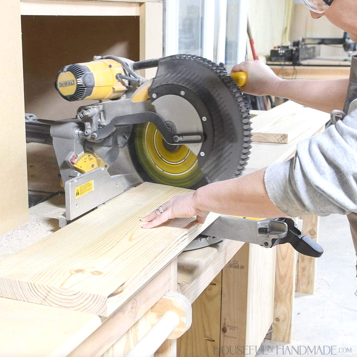 Angling a 2x10 board with a sliding miter saw.