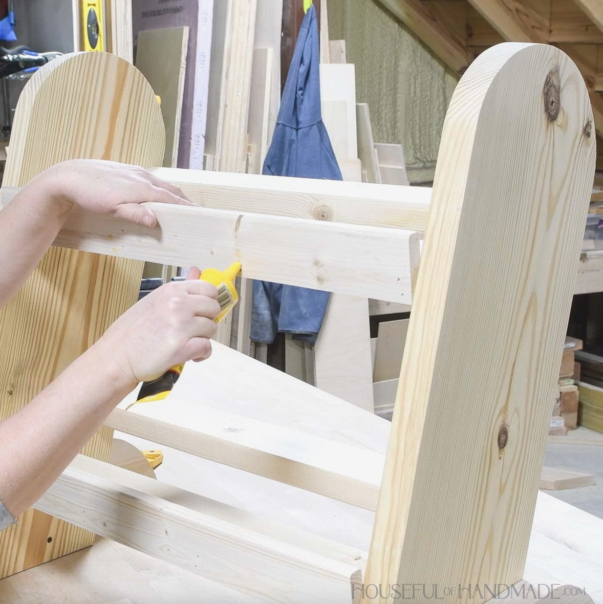 Covering nail holes with wood filler.