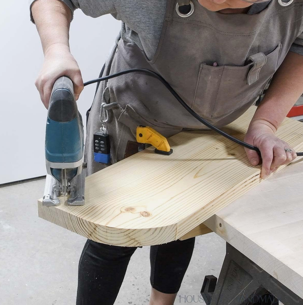 Shaping a curve in one board side with a jig saw.