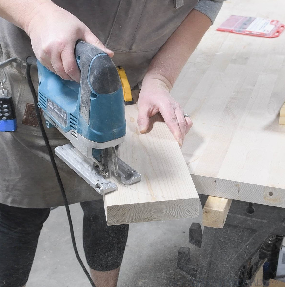 Cutting a curve on the back of the feet board.