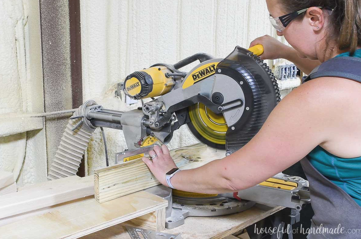 Cutting 2x4 supports with a 15 degree angle on the miter saw.