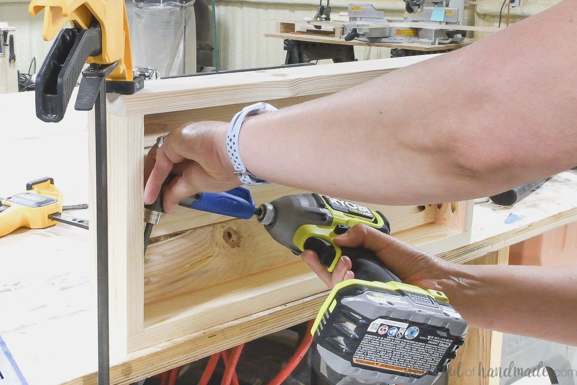 Attaching the front of a planter frame with a 90 degree angle bit.