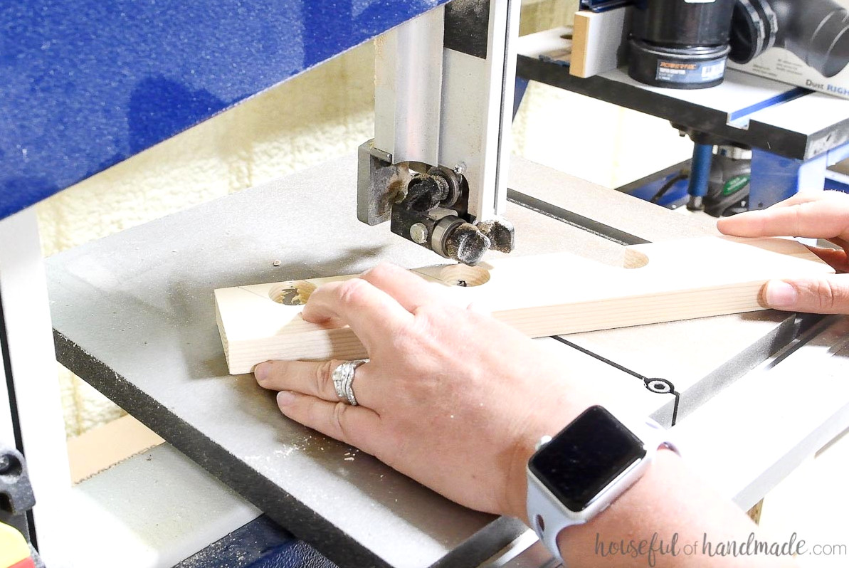 Trimming the boards on lines on a bandsaw.