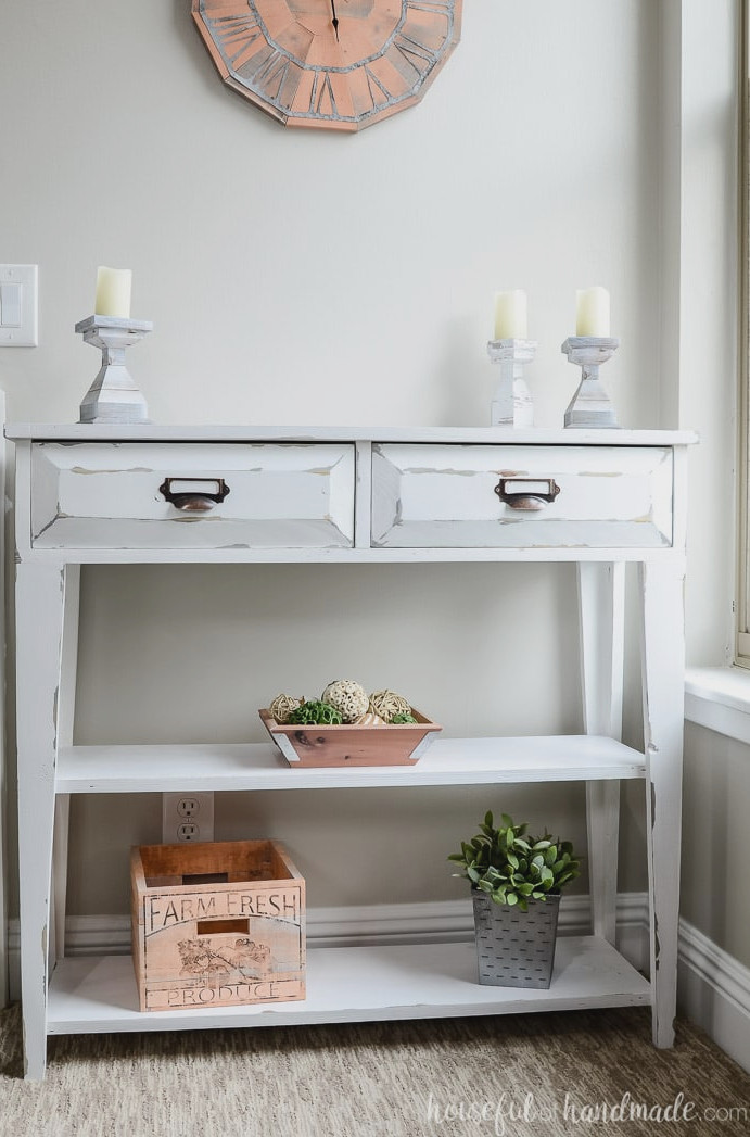 Compact farmhouse console table with two drawers and open shelves. Housefulofhandmade.com