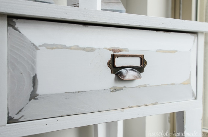 Detailed view of the distressed finish on the farmhouse console table drawer fronts. Housefulofhandmade.com