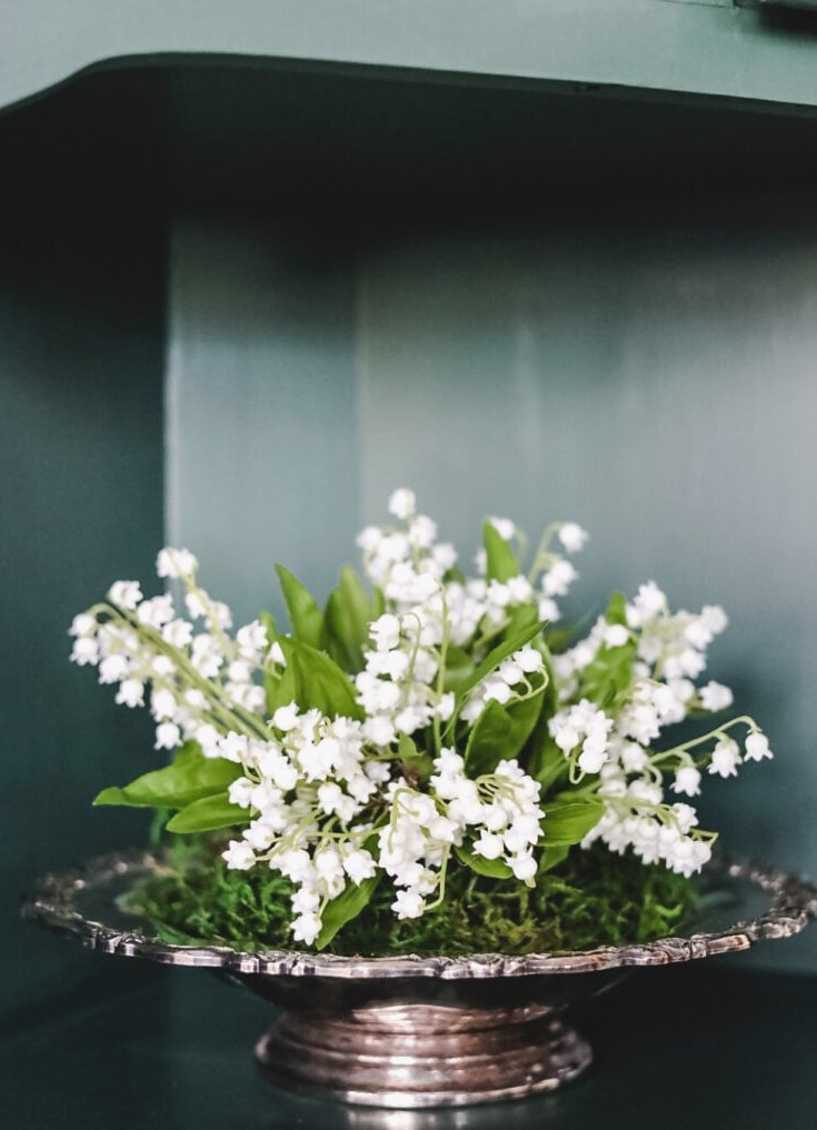 silver bowl with lilies of the valley
