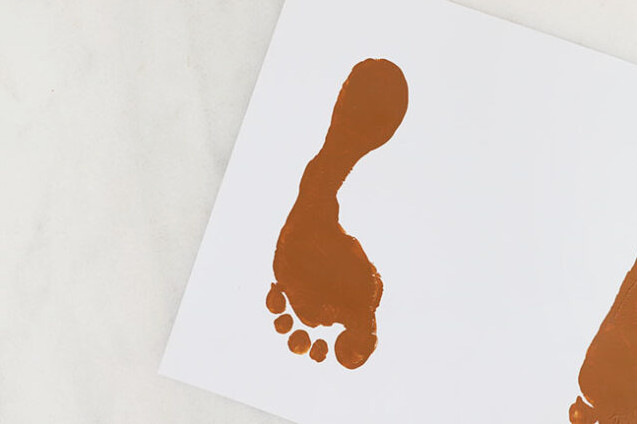 Brown footmark on paper