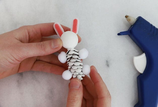 Gluing ears and arms onto body
