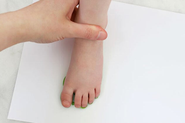 Stamping foot onto cardstock