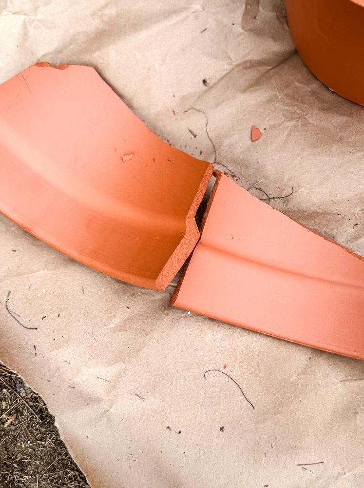 pieces of a broken terracotta pot