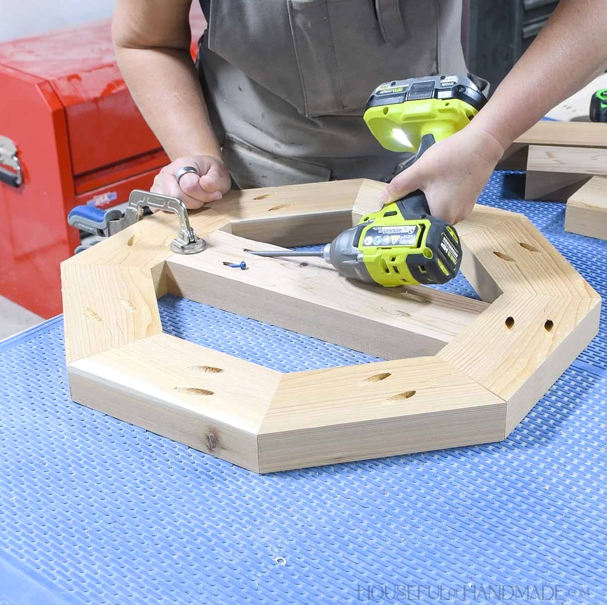 Adding a center board inside the octagon with pocket holes. 