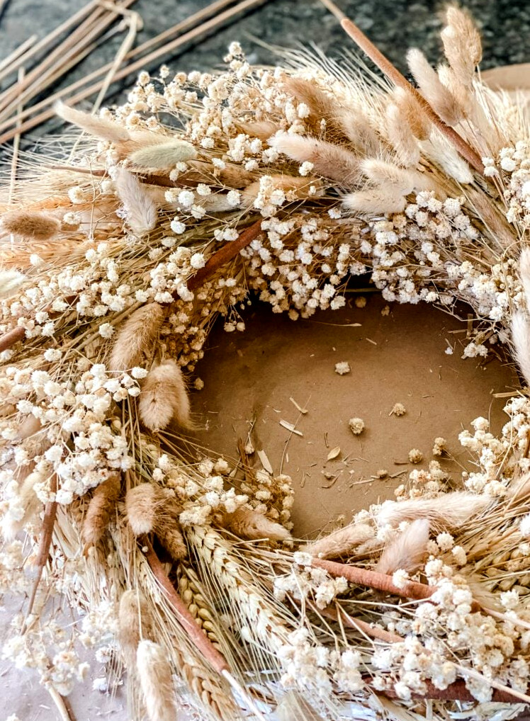 natrual dried wreath on table