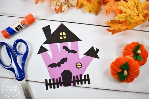 spooky handprint haunted house craft for kids