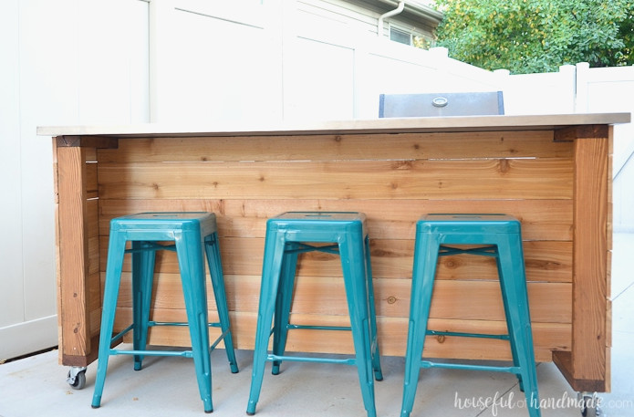 Use these incredible DIY projects to organize your home this year. This attractive outdoor kitchen island offers abundant storage and space for additional seating. Get the free build plans at Housefulofhandmade.com