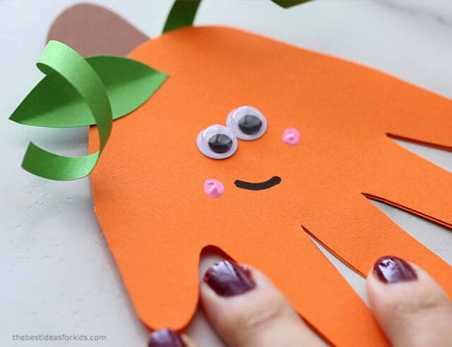 Put cheek marks on pumpkin