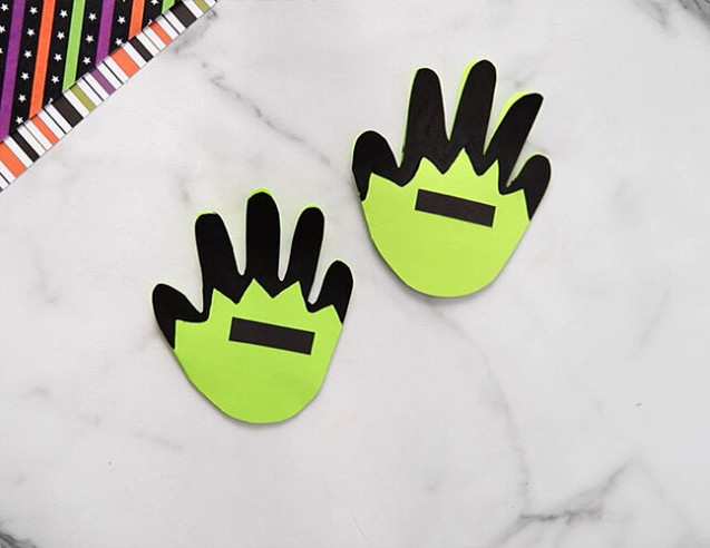 Attach black eyebrows to Frankenstein