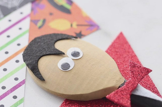 Glue on Googly Eyes to Vampire