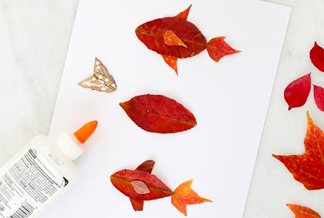 Gluing leaves together to create fish