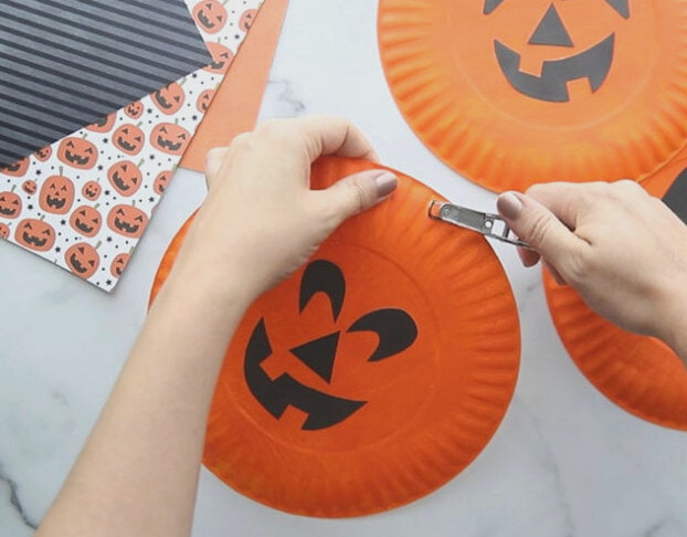 Hole punch top of paper plate