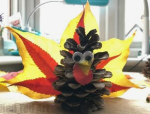 Easy Pine Cone Turkey. Make the most of those vibrant Fall Leaves for Thanksgiving
