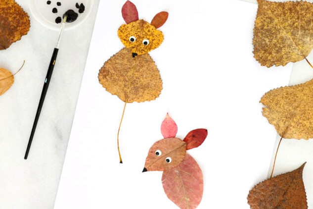 Painting eyes on leaf art mice