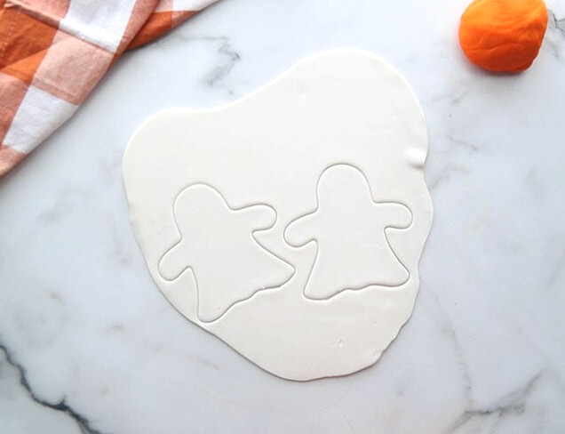 Roll out fondant and use cookie cutter