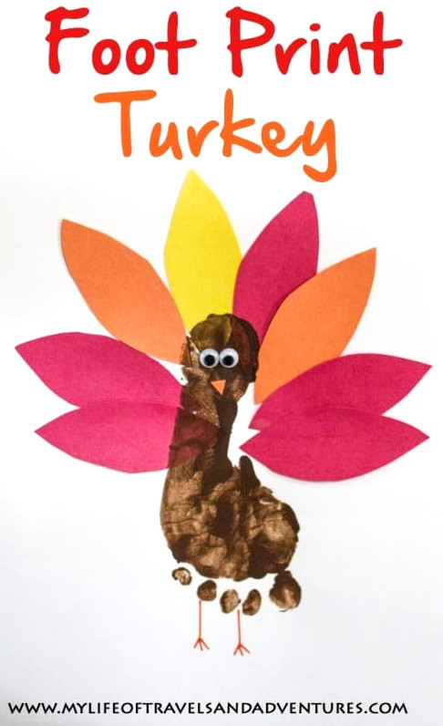 Turkey Crafts for Thanksgiving - love this footprint turkey so sweet!