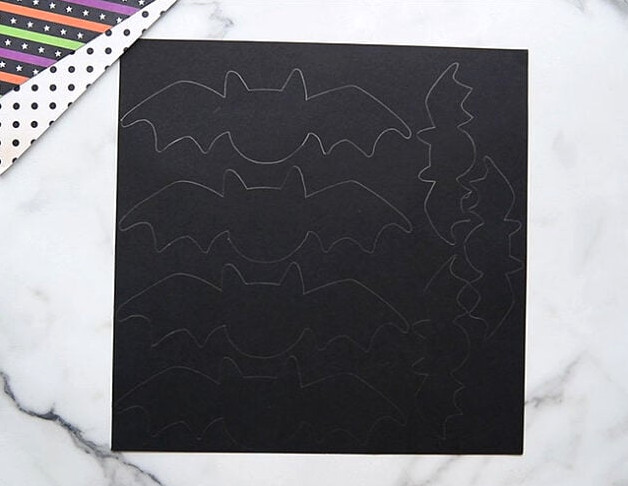 Trace templates on black cardstock