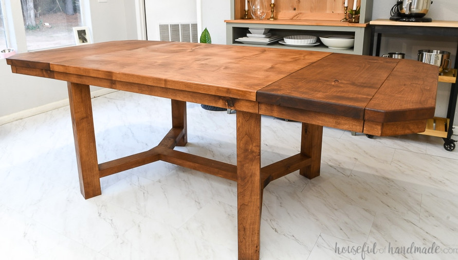 DIY trestle dining table that is 90" with both breadboard leaves installed.