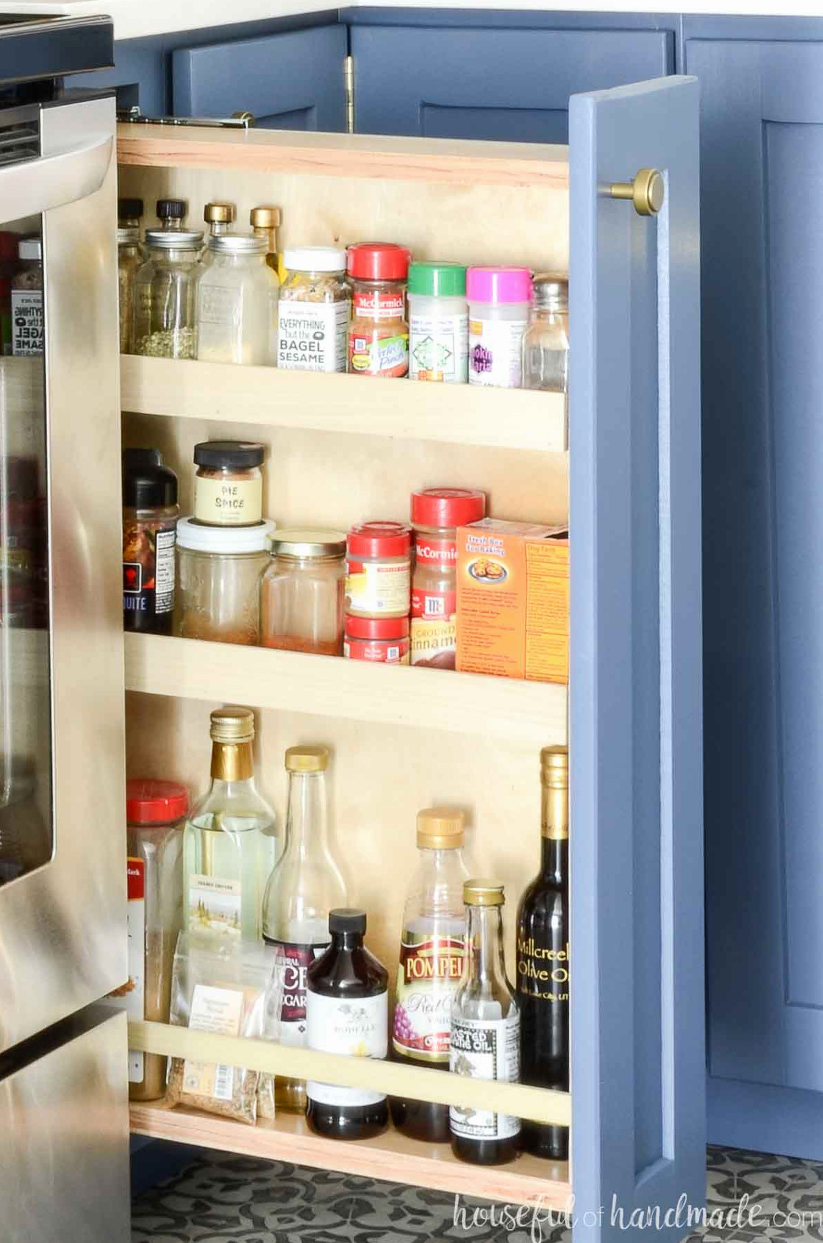 DIY plywood pull-out spice cabinet.