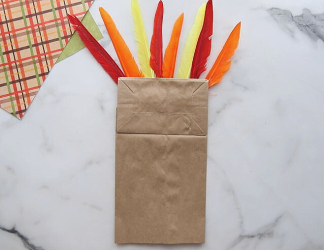 Continue Attaching Feathers to the Turkey