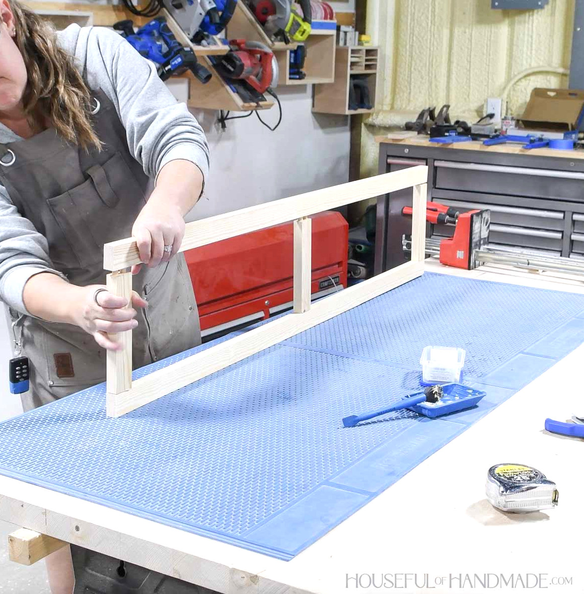 Tall door frame built with a center rail. 