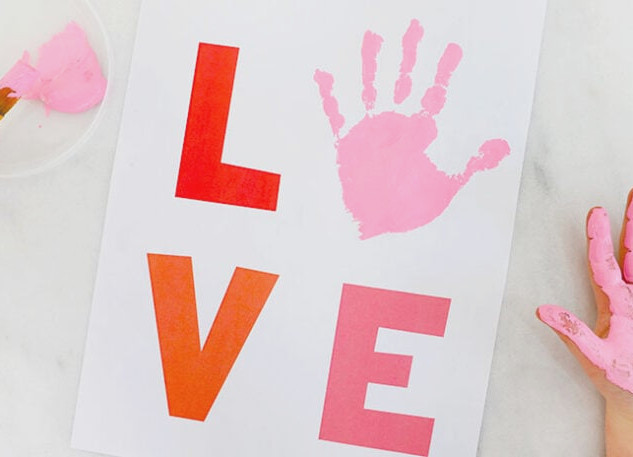 Handprint on LOVE design paper