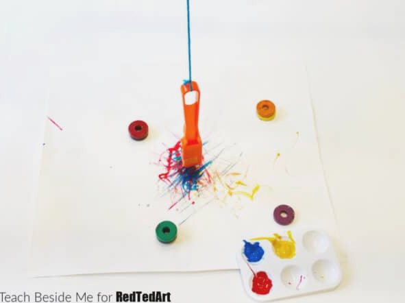 fun pendulum painting activity for kids