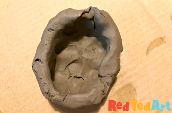 Start making an Egg Shapped Pinch Pot