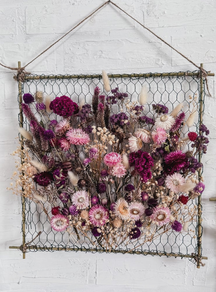 colorful dried flowers in a hanging frame