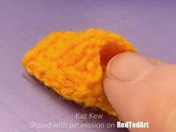 forming the duck's beak